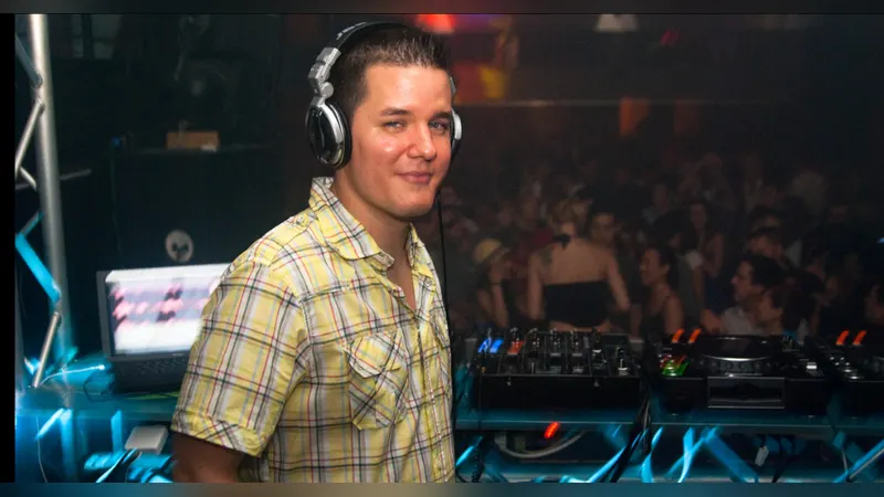 A listener wearing headphones